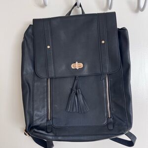 Black Leather Backpack with Tassel Accents